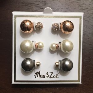 Set of three earrings.